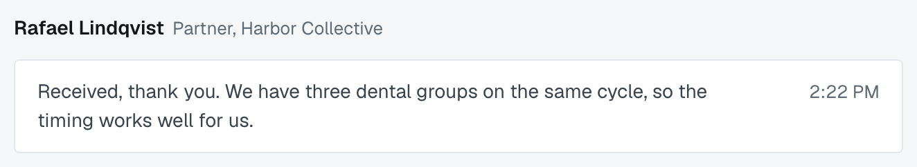 One message in a thread, with the sender's name and the grey title-and-firm line beside it